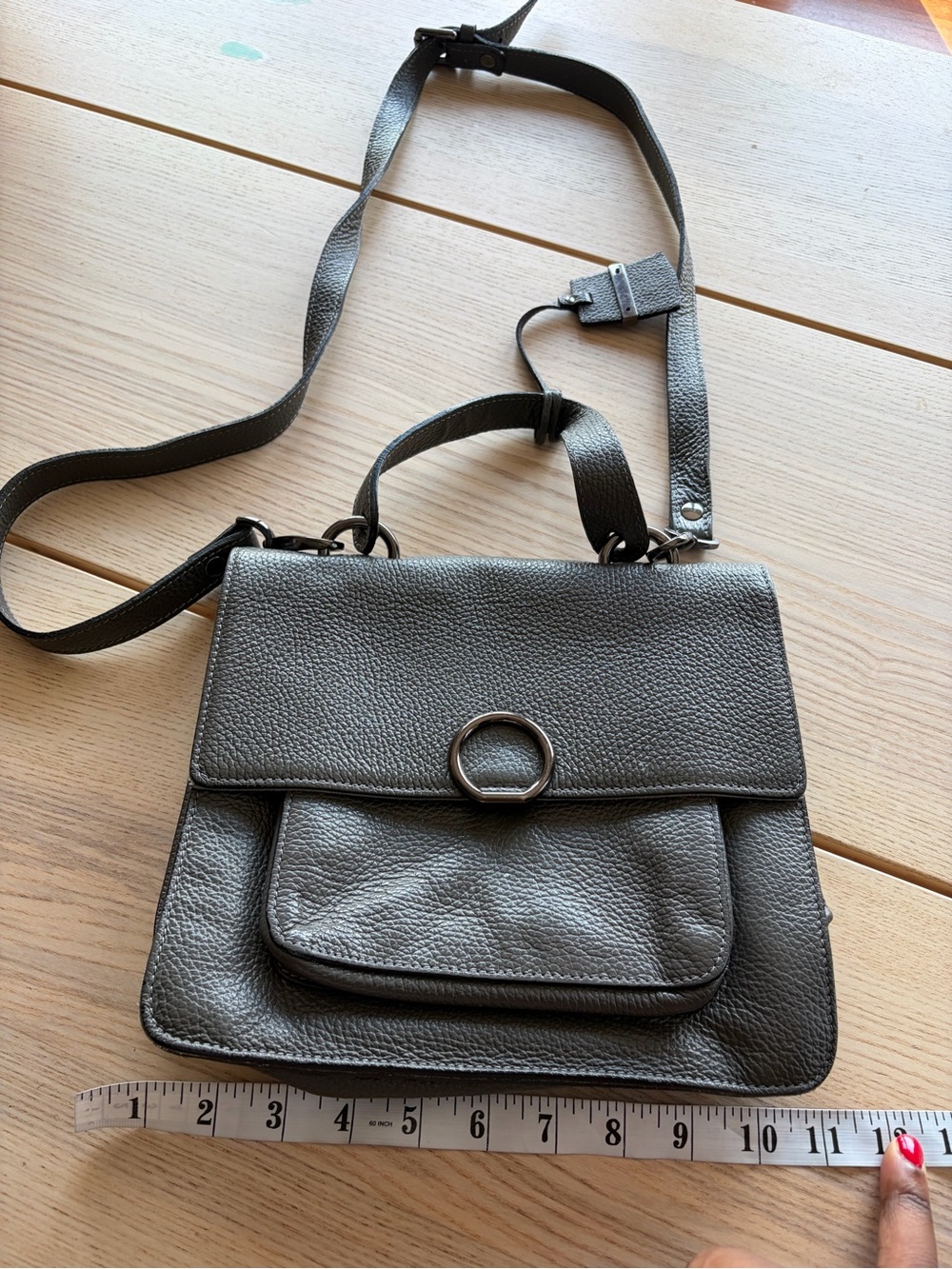 A belluci Pebbled Gray Crossbody Satchel with Ring Accent -